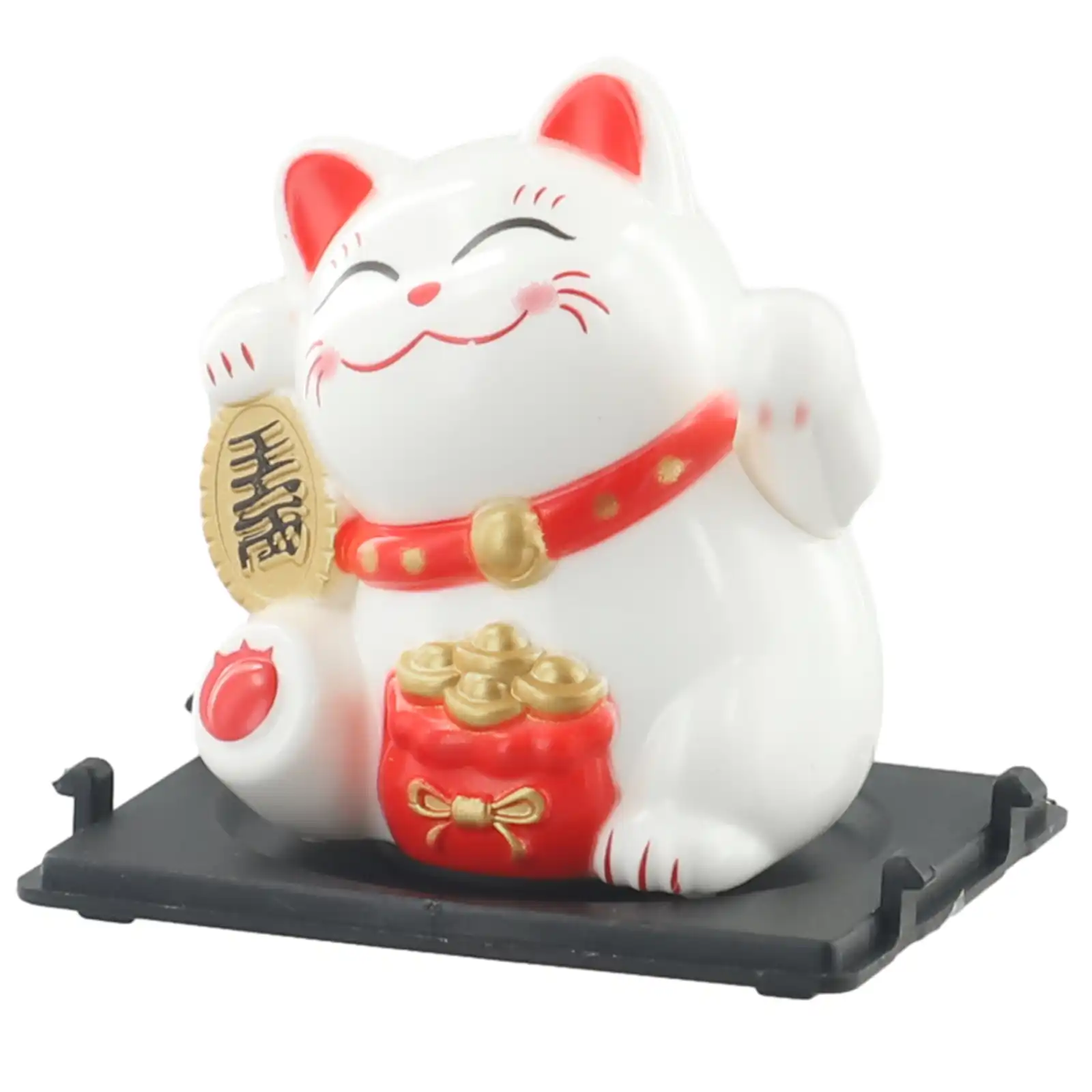 Solar powered maneki neko car interior decoration in natural lighting condition.