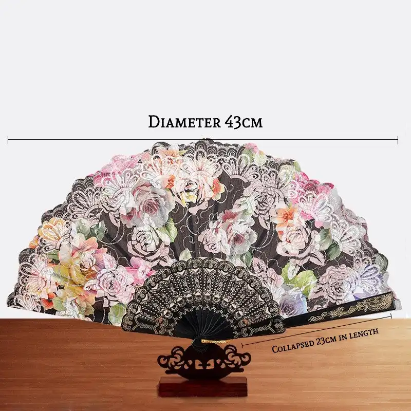 Professional model holding Japanese silk fan with tassel for wedding photography demonstration.