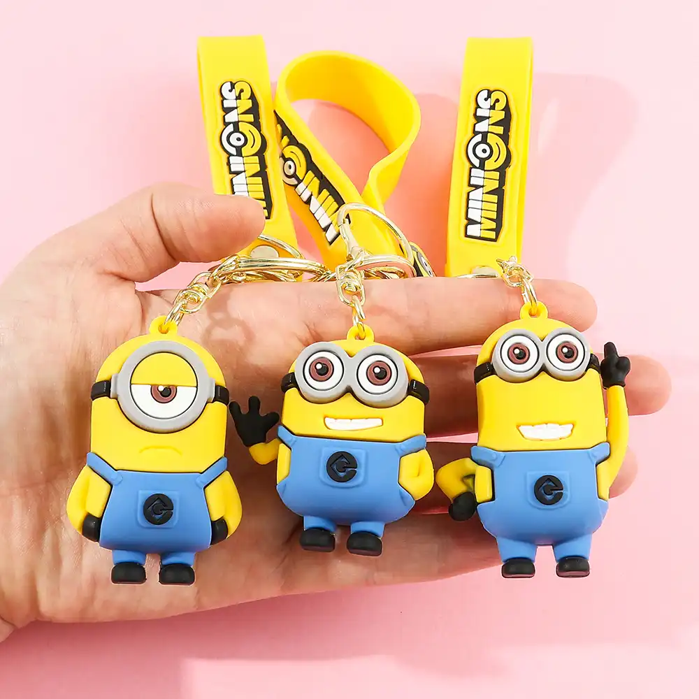 Multiple Minions keychains in different poses arranged together showing character variety options.