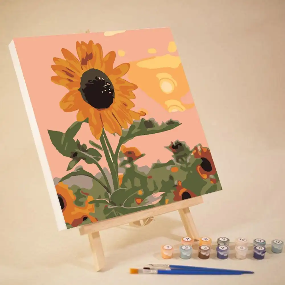 Paint by numbers technique demonstration with brush and numbered paint.