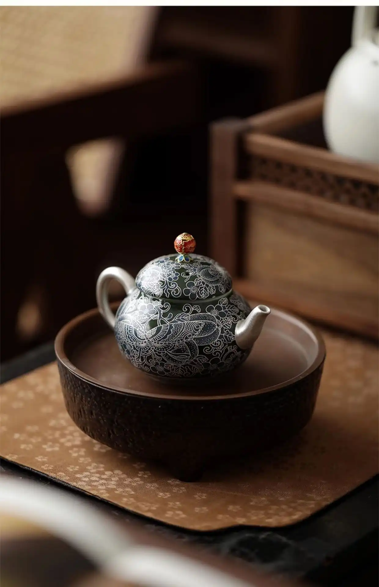 Interior view of teapot showing high-quality ceramic construction and heat retention design.