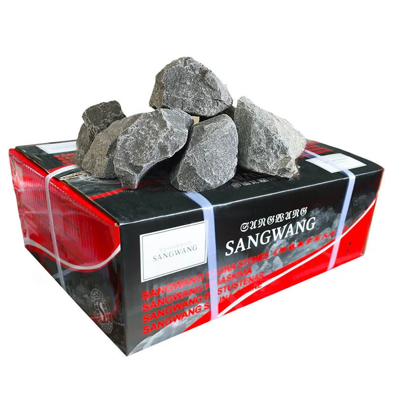 Handful of premium volcanic sauna rocks displaying consistent size and natural gray coloration.