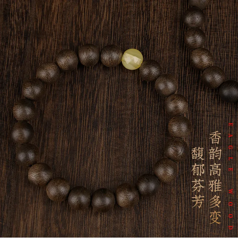 Kyara agarwood bracelet worn on wrist demonstrating comfortable fit and elegant appearance.