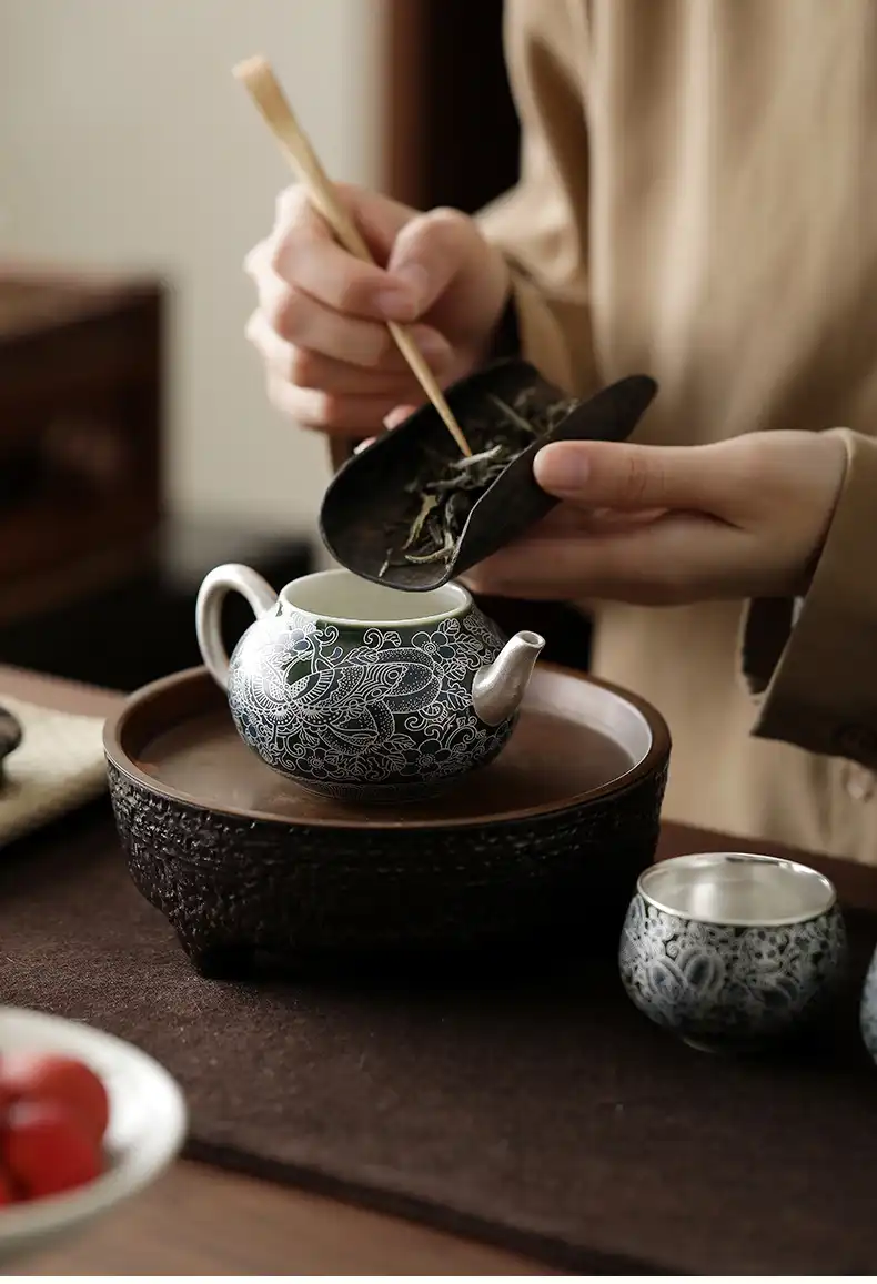 Traditional kung fu tea ceremony setup with Palace Museum inspired butterfly cloisonne teaware.