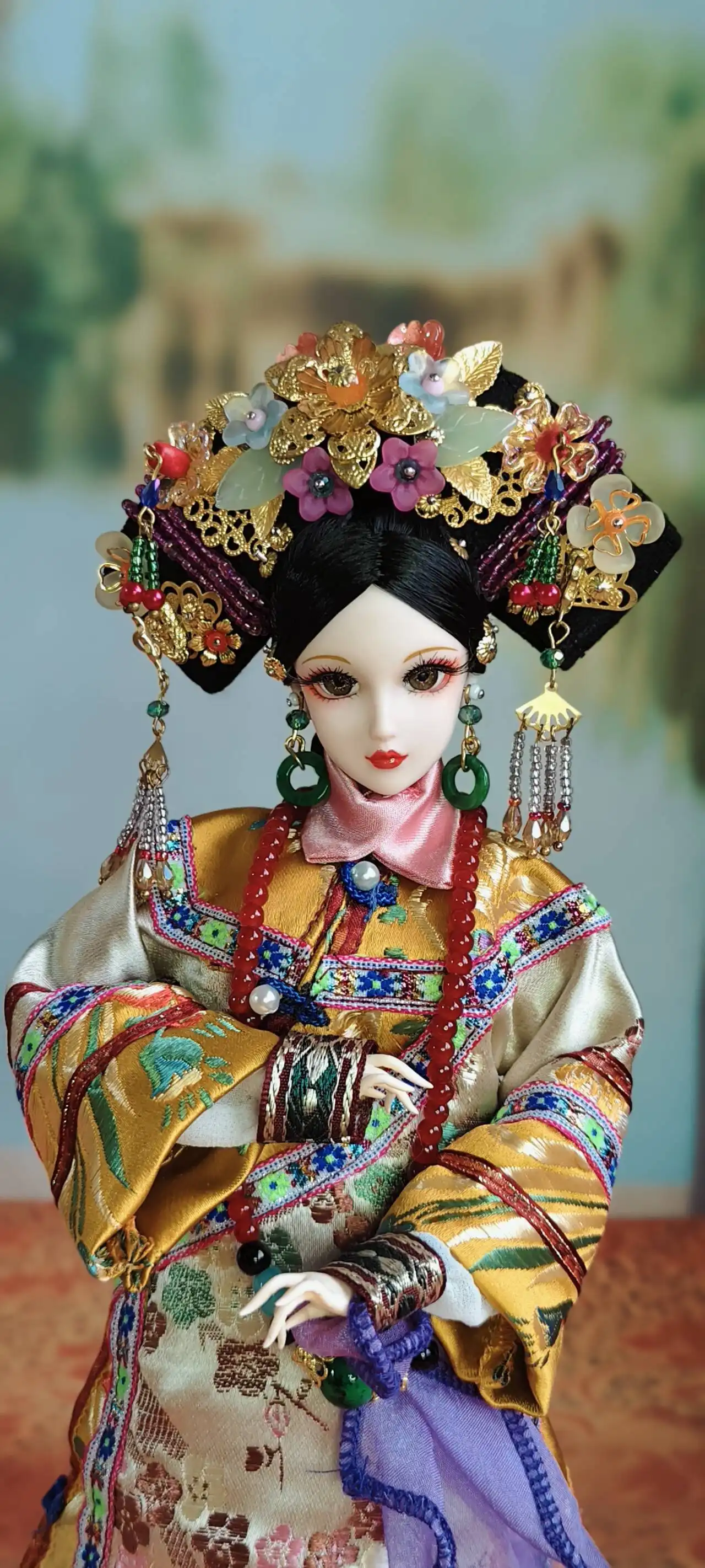 Close up of doll hands showing detailed craftsmanship and proportional accuracy.