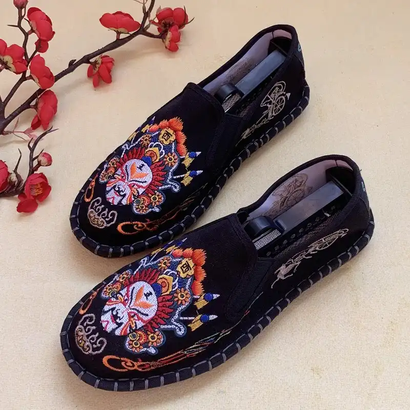 Side profile view of above-ankle Hanfu shoes showing vintage ethnic styling and slip-on design.