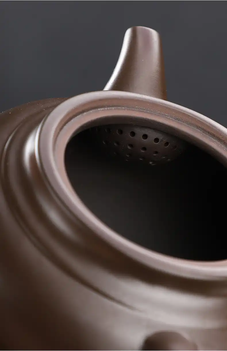 Authentic purple clay material close-up highlighting natural texture and porous surface quality.