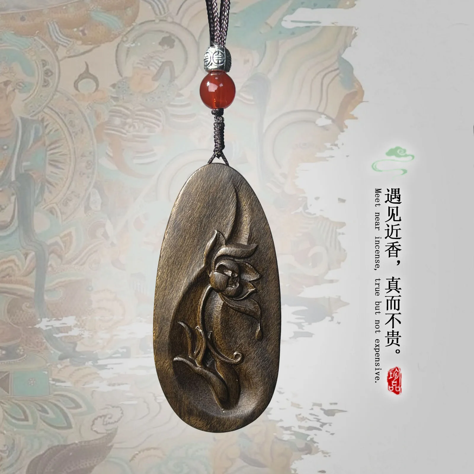 Close-up view of natural agarwood Guanyin carving showing authentic wood grain and craftsmanship.