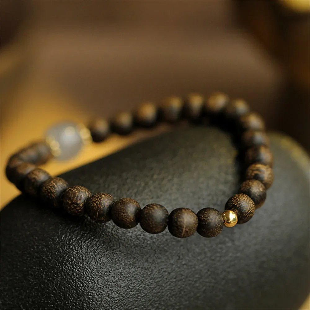 Complete bracelet layout on wooden surface emphasizing natural materials and spiritual harmony.