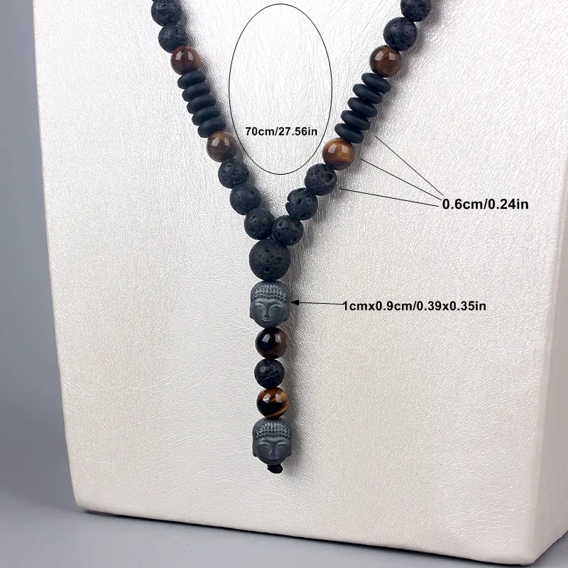 Buddha necklace flat lay tiger eye lava stone beads hematite spacers spiritual jewelry gift box.
