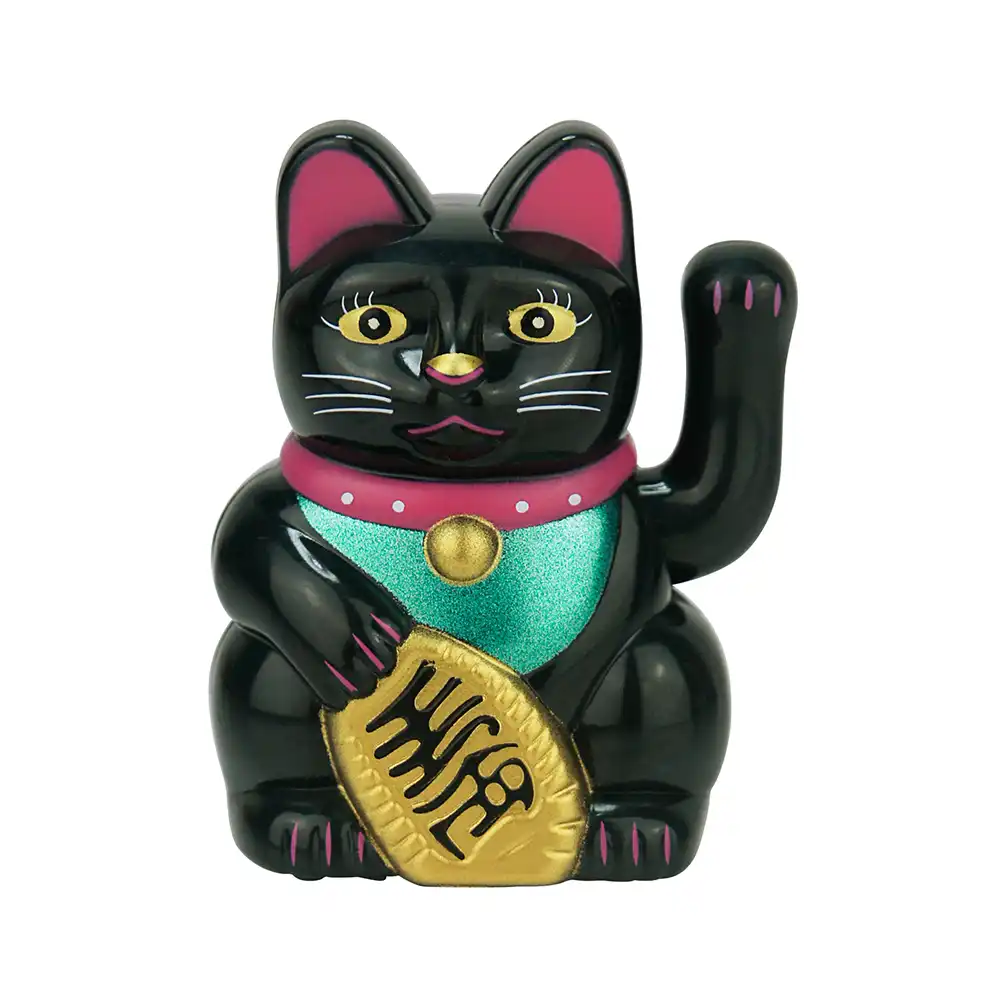 Lucky cat decoration showing weather resistant plastic construction material.