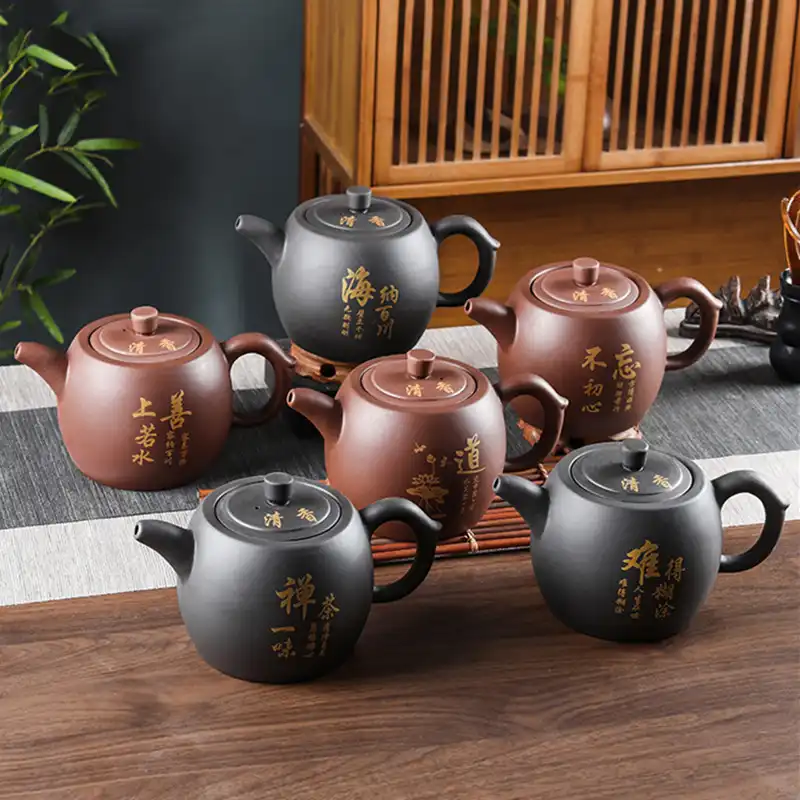Traditional beauty design elements of handmade Yixing purple clay teapot with elegant proportions.