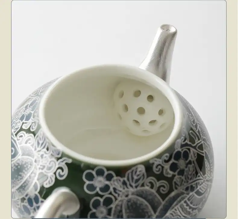 Chinese Palace Museum butterfly cloisonne tea set with traditional kung fu teapot and two cups.