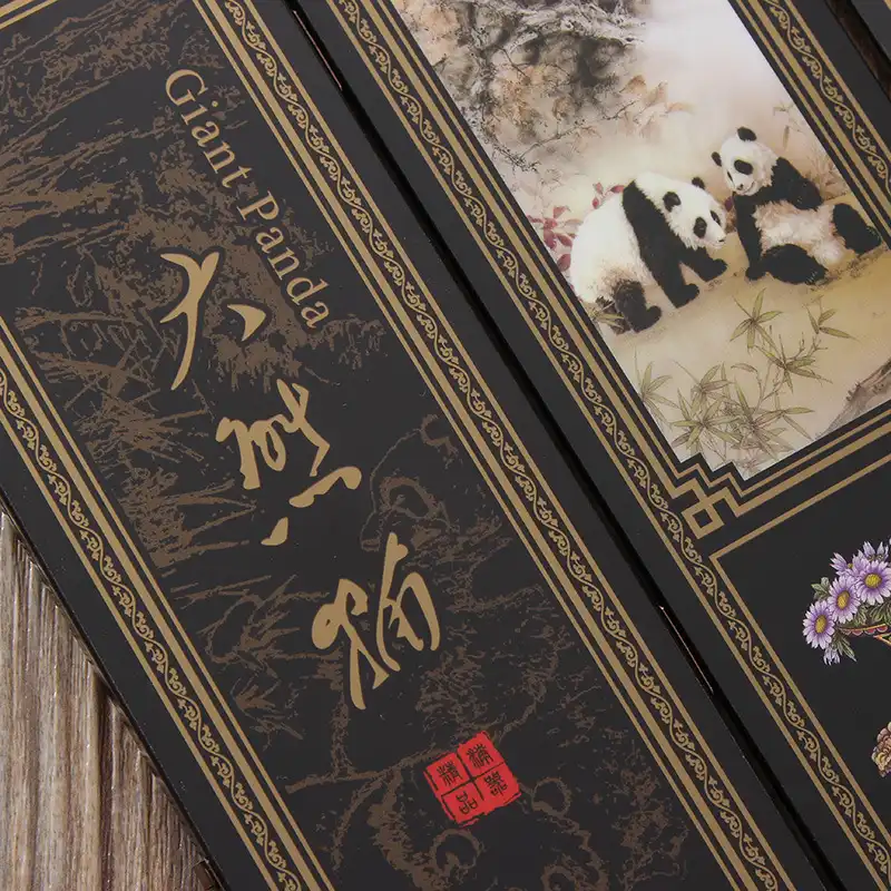 Traditional Chinese landscape painting close up on lacquerware screen showing artistry.