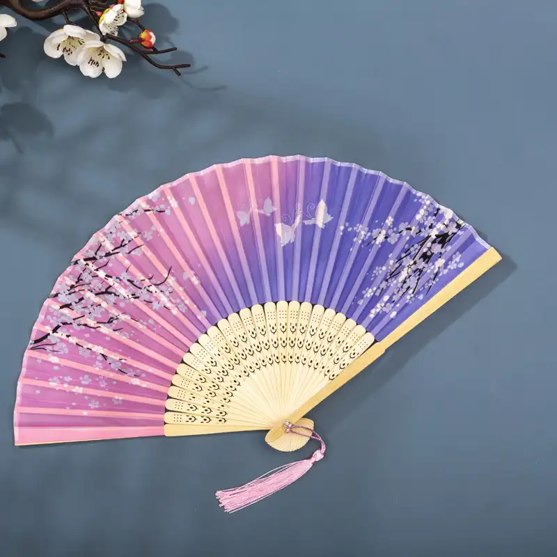 Side view displaying bamboo rib structure and silk attachment craftsmanship details.