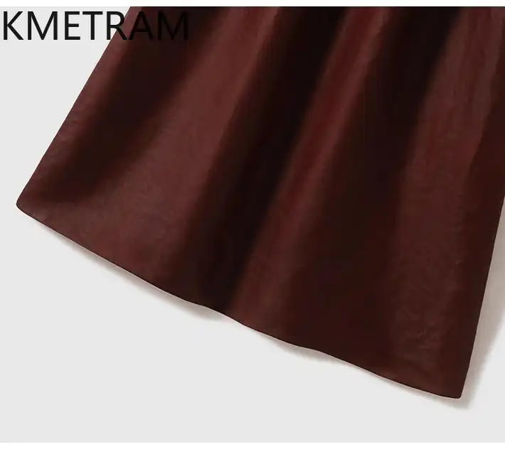 Luxury Xiangyunsha silk women's dress displayed flat showing elegant O-neck and mid-calf length.