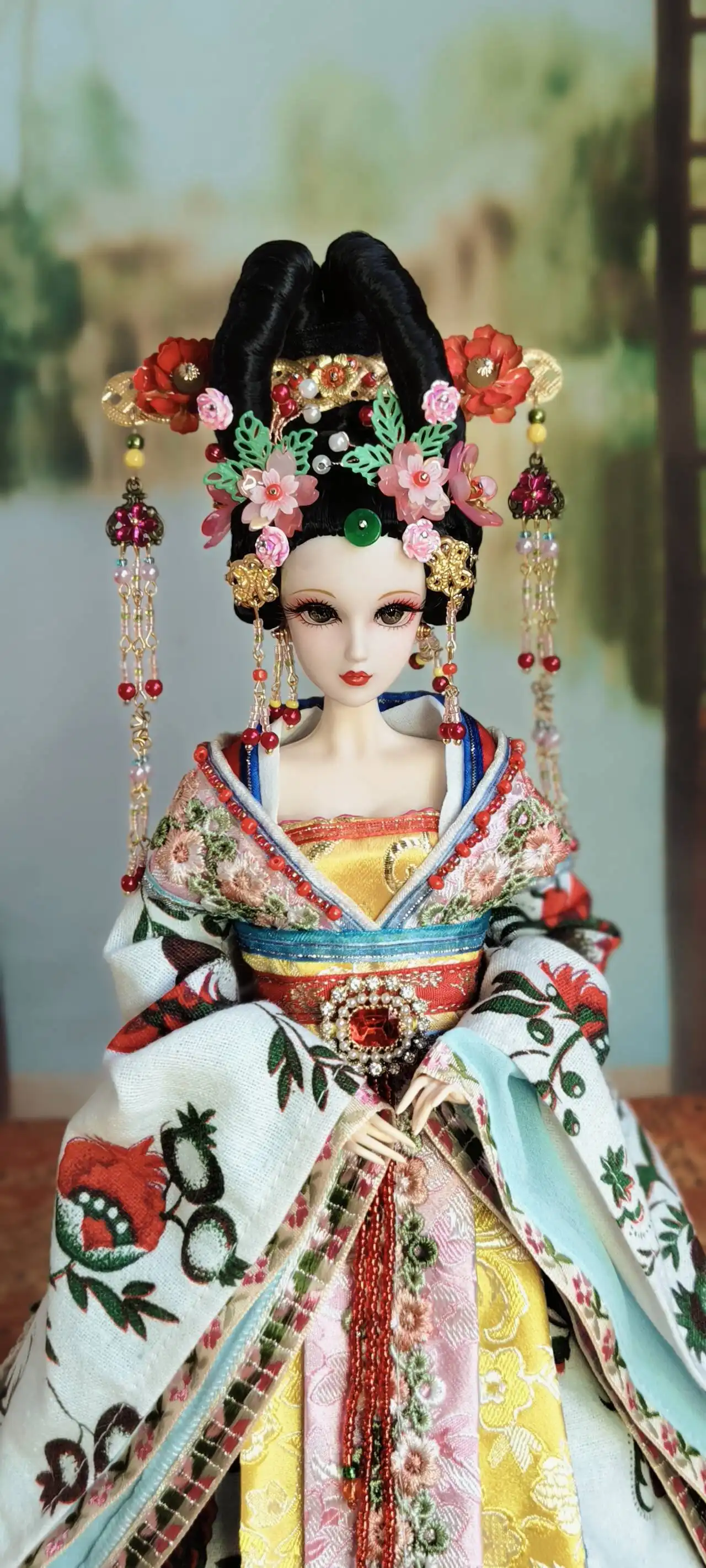 Close up of doll face displaying detailed makeup artistry and authentic Chinese styling.