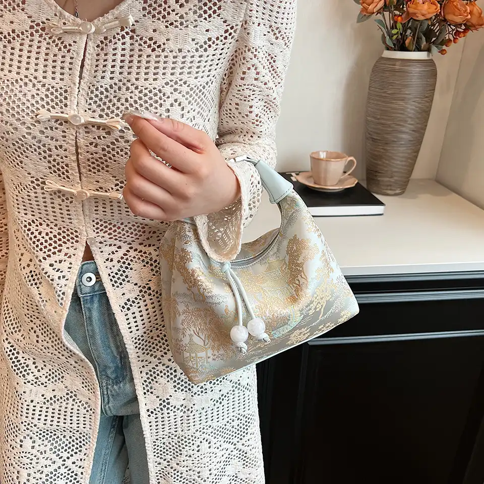Multiple angle view of embroidery bag showcasing design versatility.