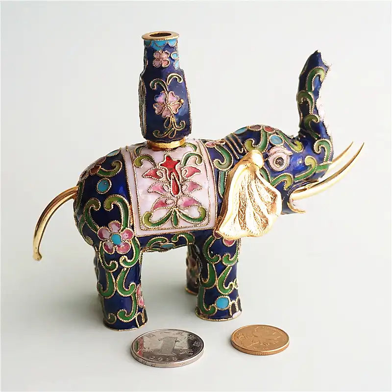 Top view of cloisonne elephant ornament displaying copper wire design compartments.