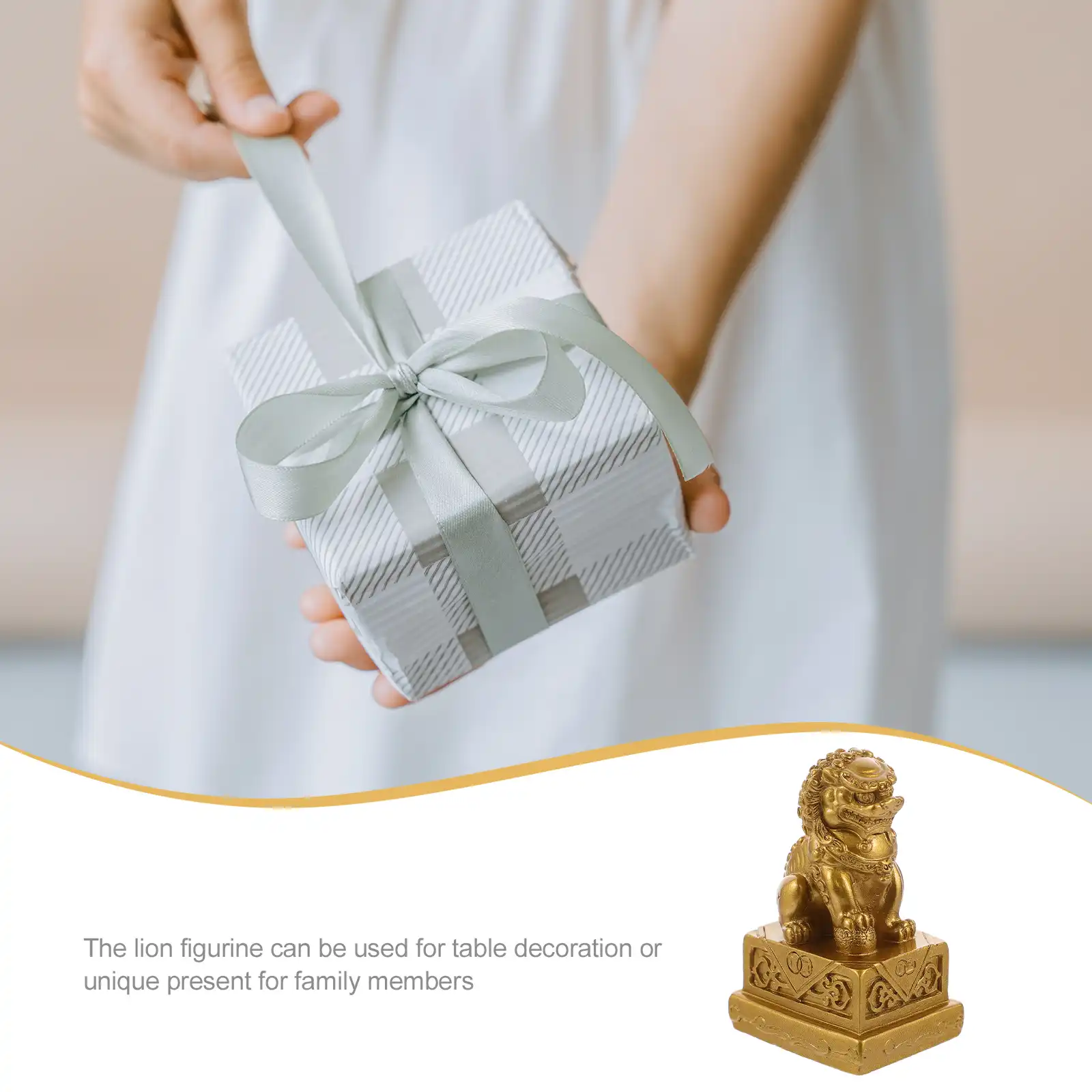Close-up view of single golden lion figurine highlighting intricate facial features and textured mane details.
