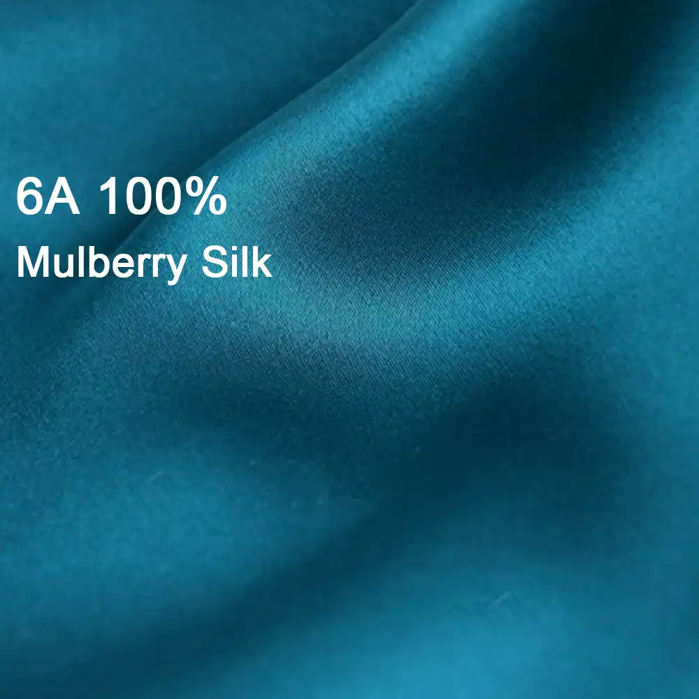 Close-up texture of 100% pure double-sided natural silk fabric showing quality and smoothness.