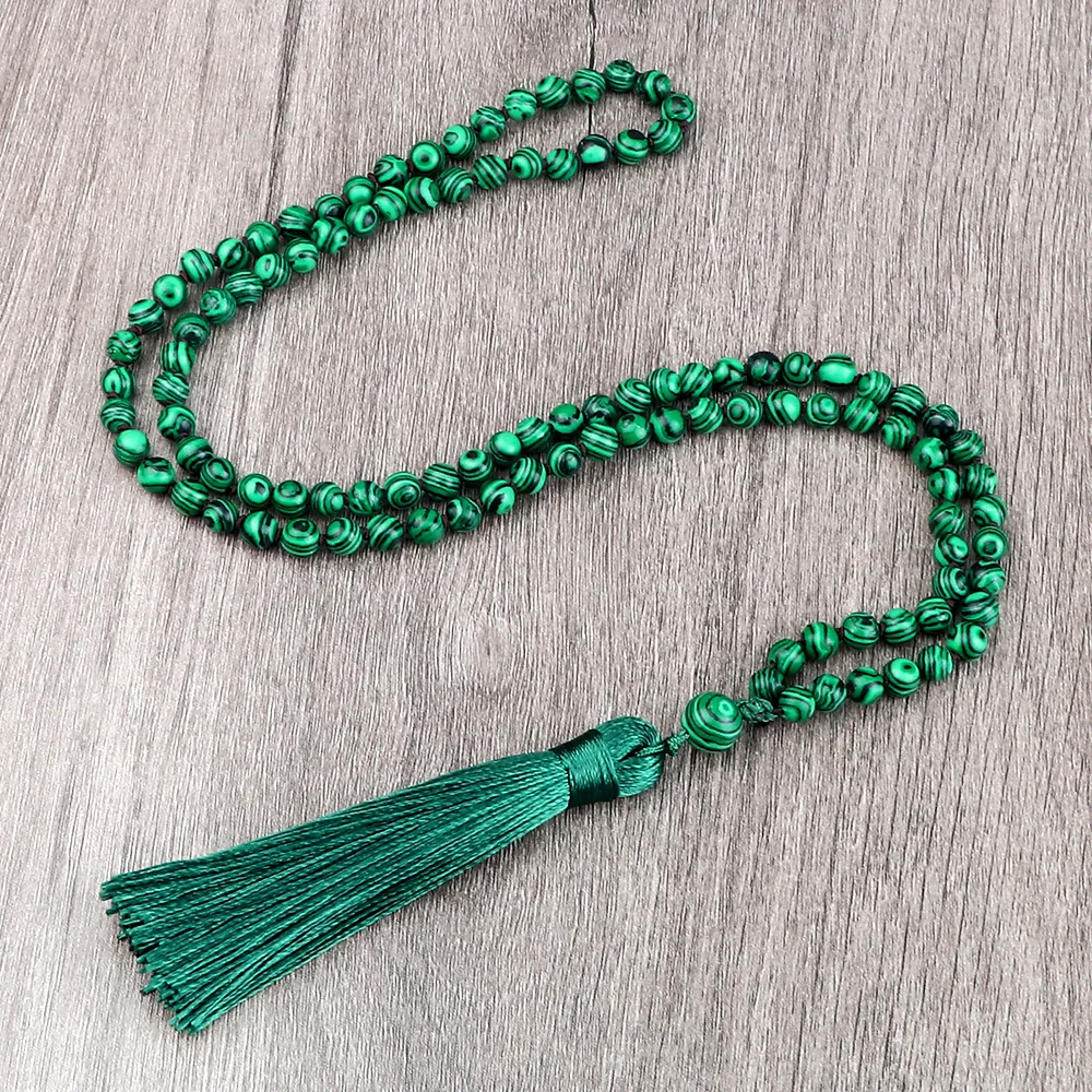 Natural green onyx mala beads gift box packaging for spiritual jewelry present.