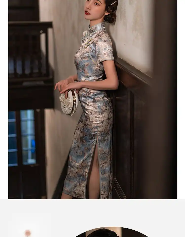 Front view of elegant blue qipao showing classic button details and fitted silhouette.