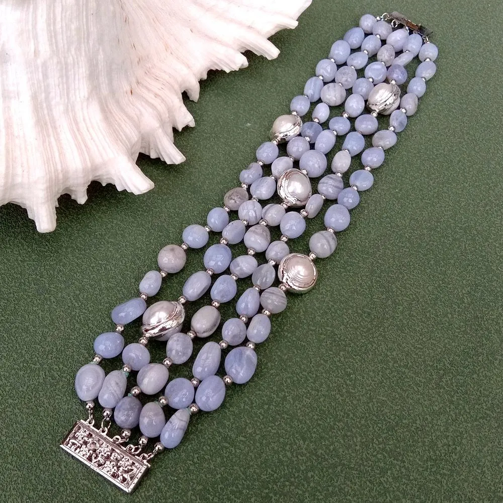 Complete bracelet in silk pouch packaging showing fine jewelry presentation.
