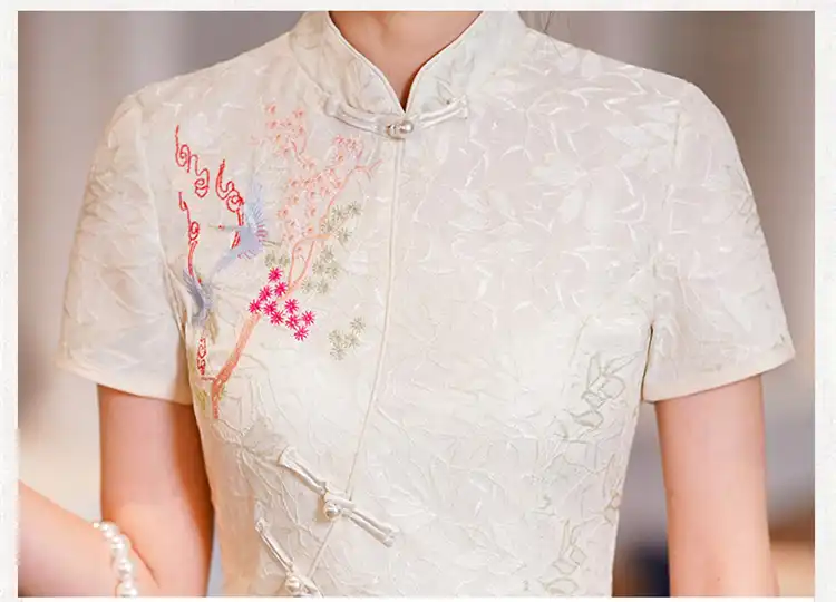 Back view of vintage qipao showing traditional silhouette and cotton polyester fabric.