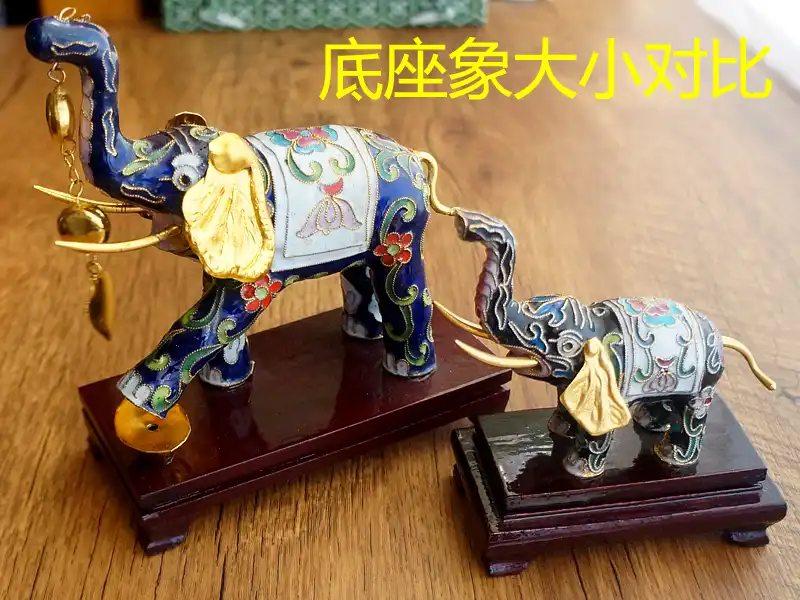 Vintage cloisonne elephant figurine displaying traditional copper wire enamel craftsmanship.