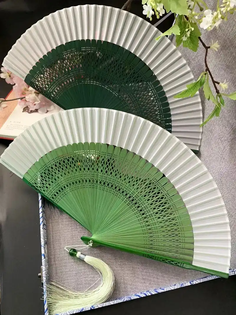 Portable design of Japanese dance fan folded to compact size for easy carrying.
