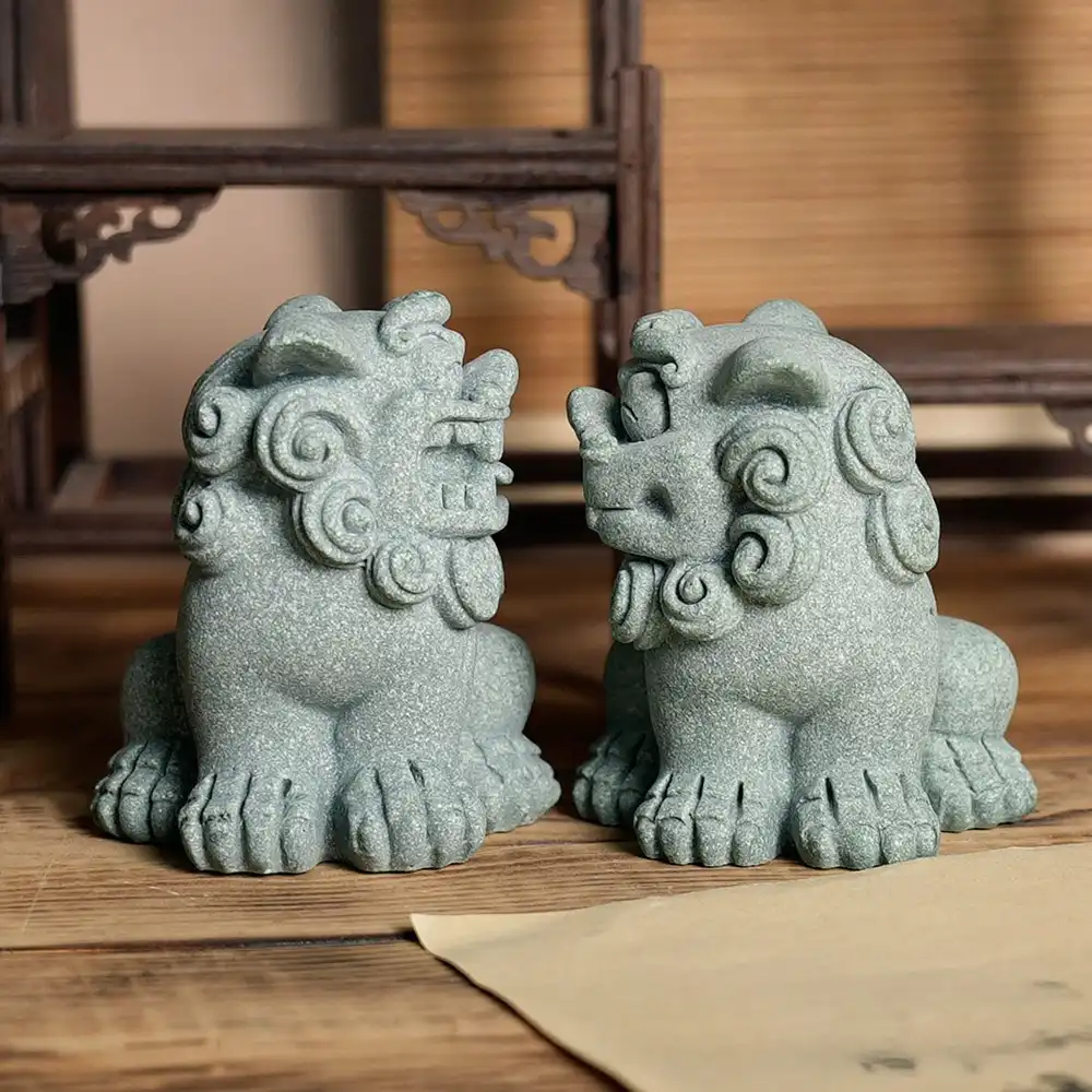 Traditional feng shui foo dog statues showing intricate hand-carved details and authentic design.