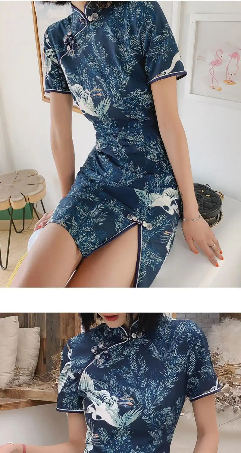 Model wearing crane print qipao showing modern A-line silhouette and short sleeve design.