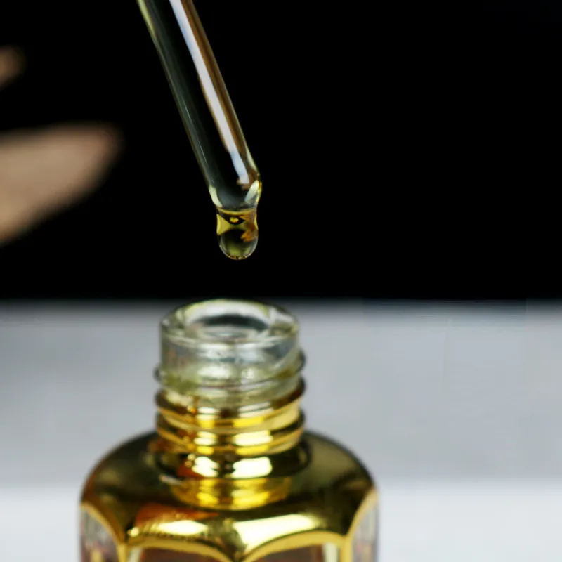 Three different sizes of Qinan essential oil bottles - 3g, 6g, and 12g options available.