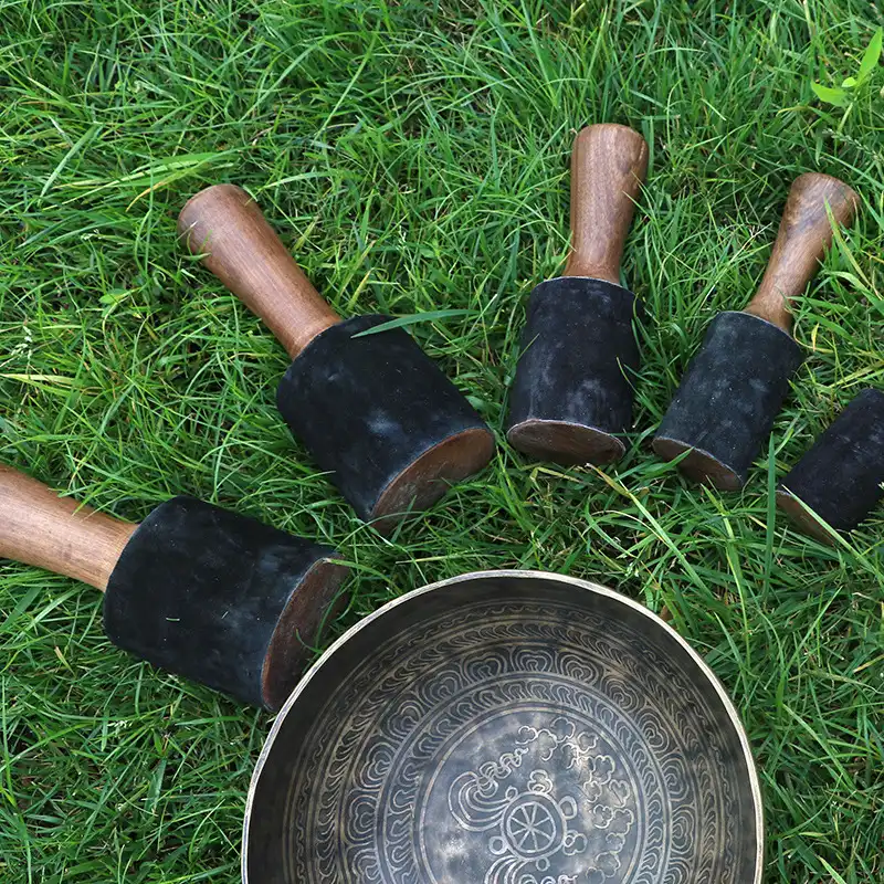 Dark peach wood handle texture detail highlighting quality craftsmanship and finish.