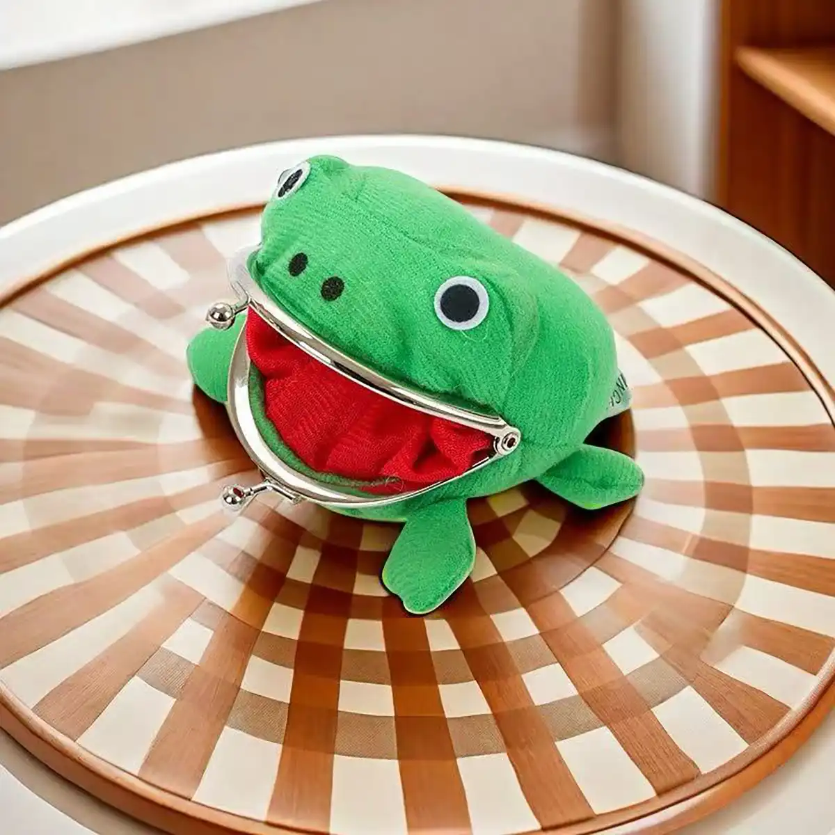 Cartoon frog coin holder keychain for cosplay, close-up shot..