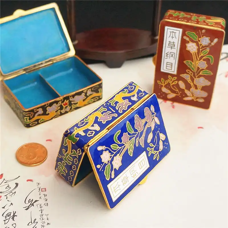 Traditional Chinese cloisonne box patterns featuring classic motifs and color combinations.