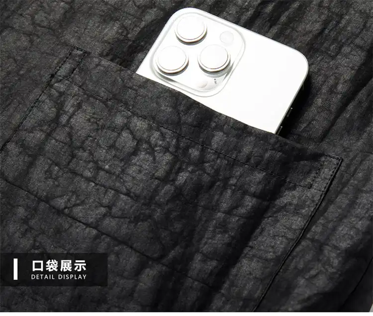 Back view of Gambiered silk shirt showing full drape and quality tailoring details.