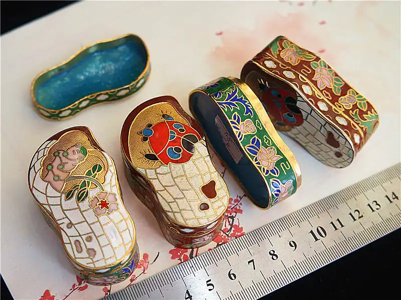 Bottom view of cloisonne box showing authentic copper base and maker marks from 1990s production.