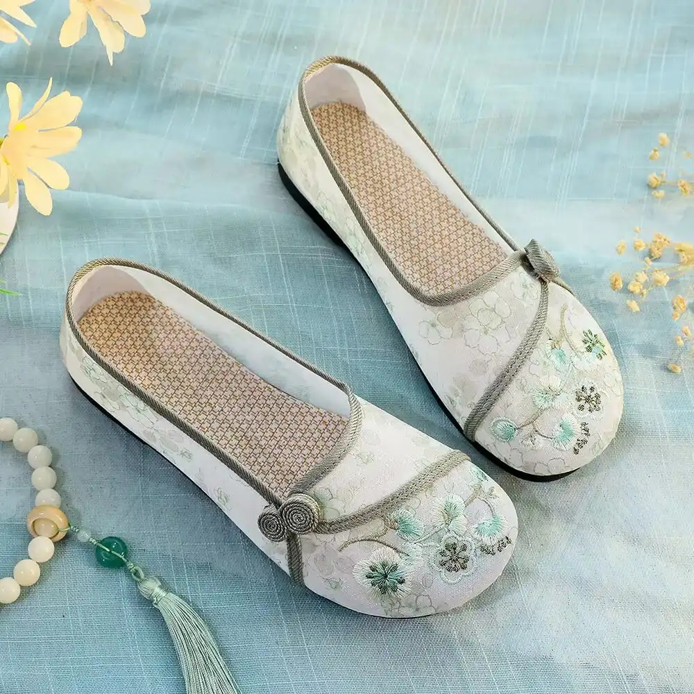 Back view of Old Beijing cloth shoes showing heel design and overall traditional silhouette.