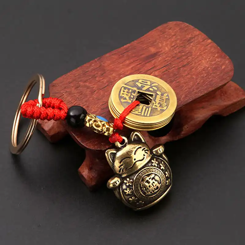 Handmade brass feng shui lucky cat keychain with five emperor coins charm pendant.
