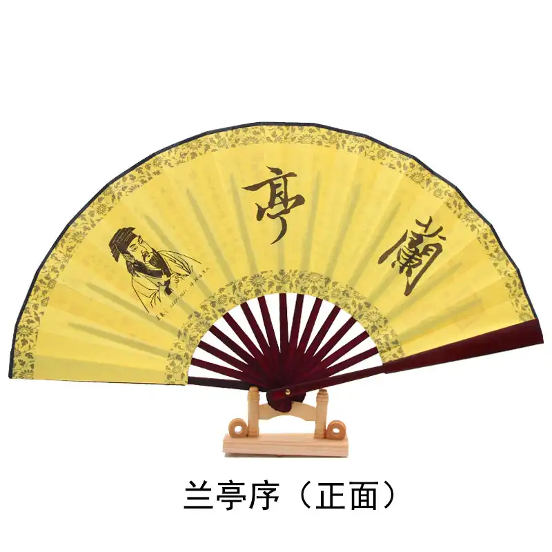 Male hand holding opened Chinese bamboo fan demonstrating proper grip and elegant usage posture.