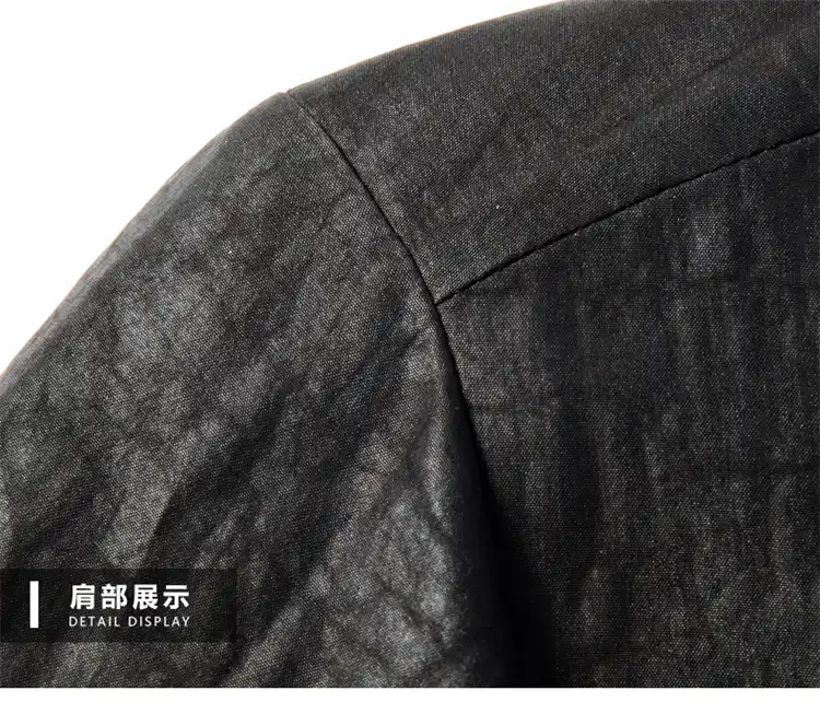Side profile of model wearing Gambiered silk shirt displaying loose comfortable fit styling.