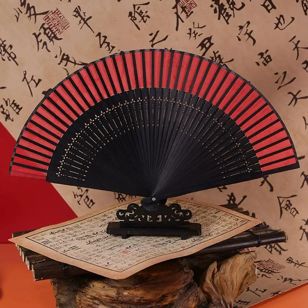 Quality comparison showing premium silk construction versus standard fan materials.
