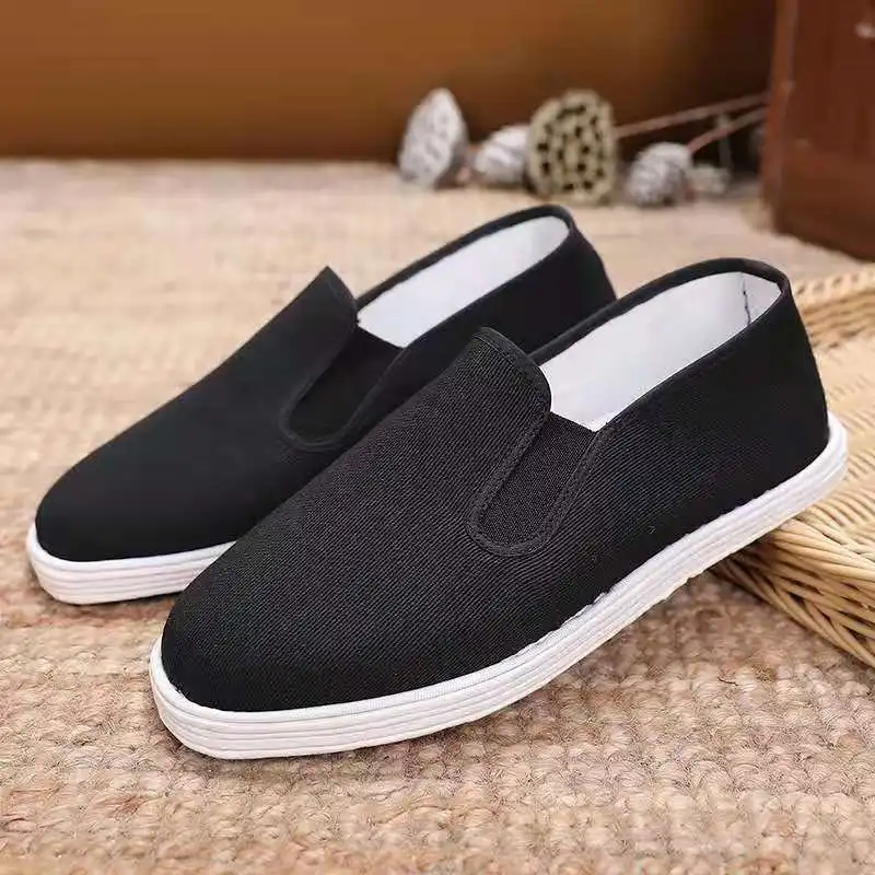 Side view of Wing Chun Tai Chi shoes showing breathable cotton material and flexible construction.