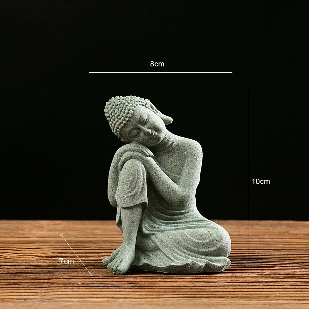 Multiple mini Buddha statues arranged for home zen garden tablescape decoration display.