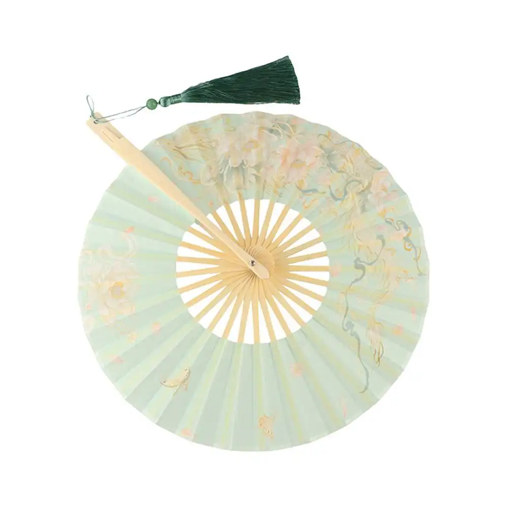 Seasonal styling guide featuring round bamboo fan as summer fashion accessory.