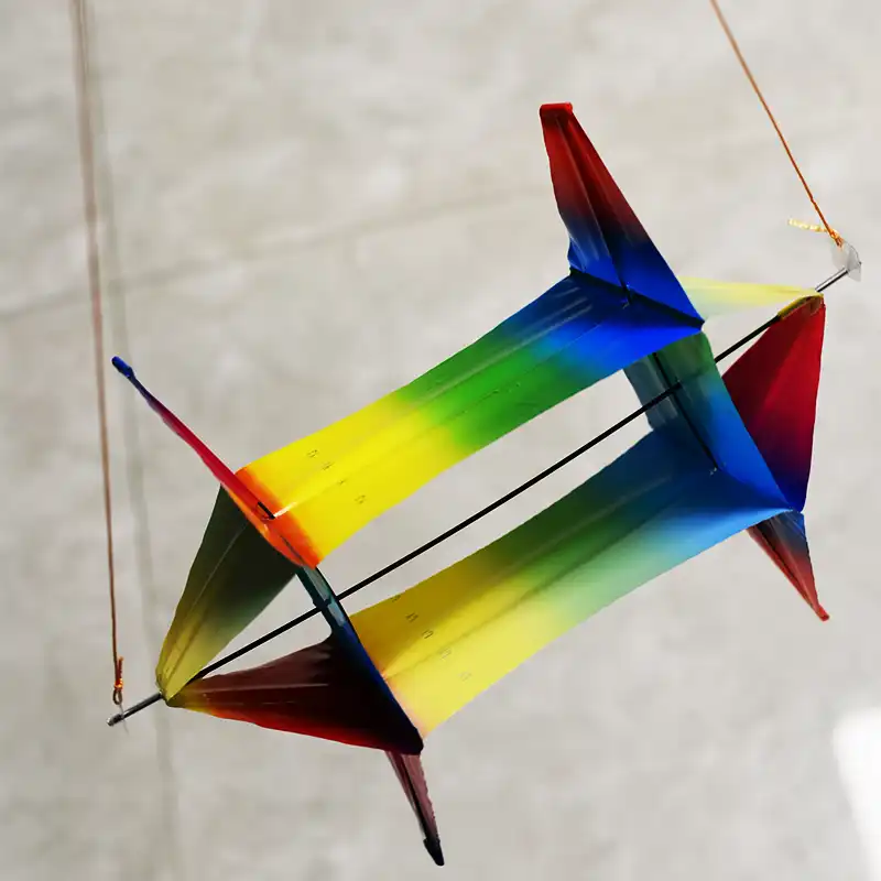 Rotating fish kite performing smooth flight demonstrating stable aerial performance outdoors.