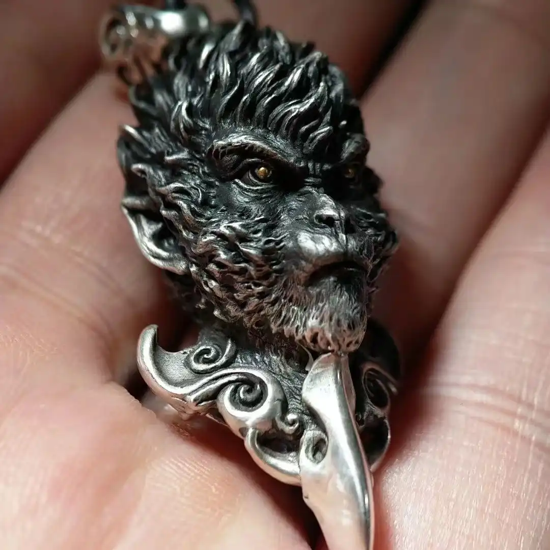 Black Myth Wukong pendant worn by model demonstrating size scale and elegant appearance on necklace chain.