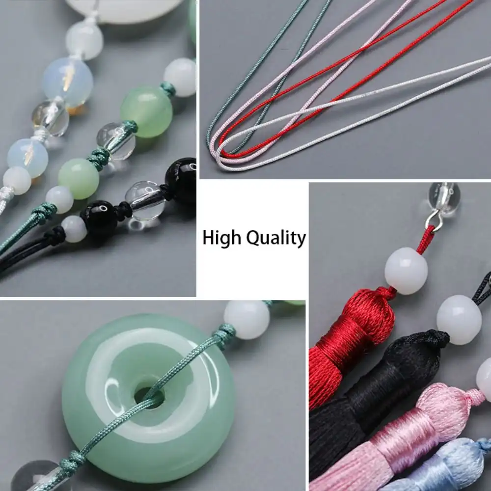 Jade lotus tassel pendant worn with traditional hanfu outfit on female model.